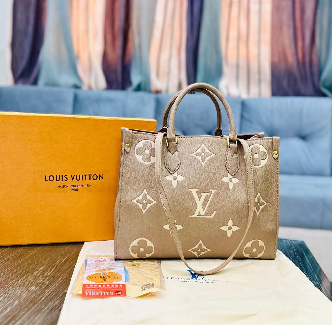 Louis Vuitton Bicolour Monogram Empreinte Leather Tote Bag